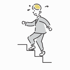 階段を慎重に登るビジネスマンのイメージ